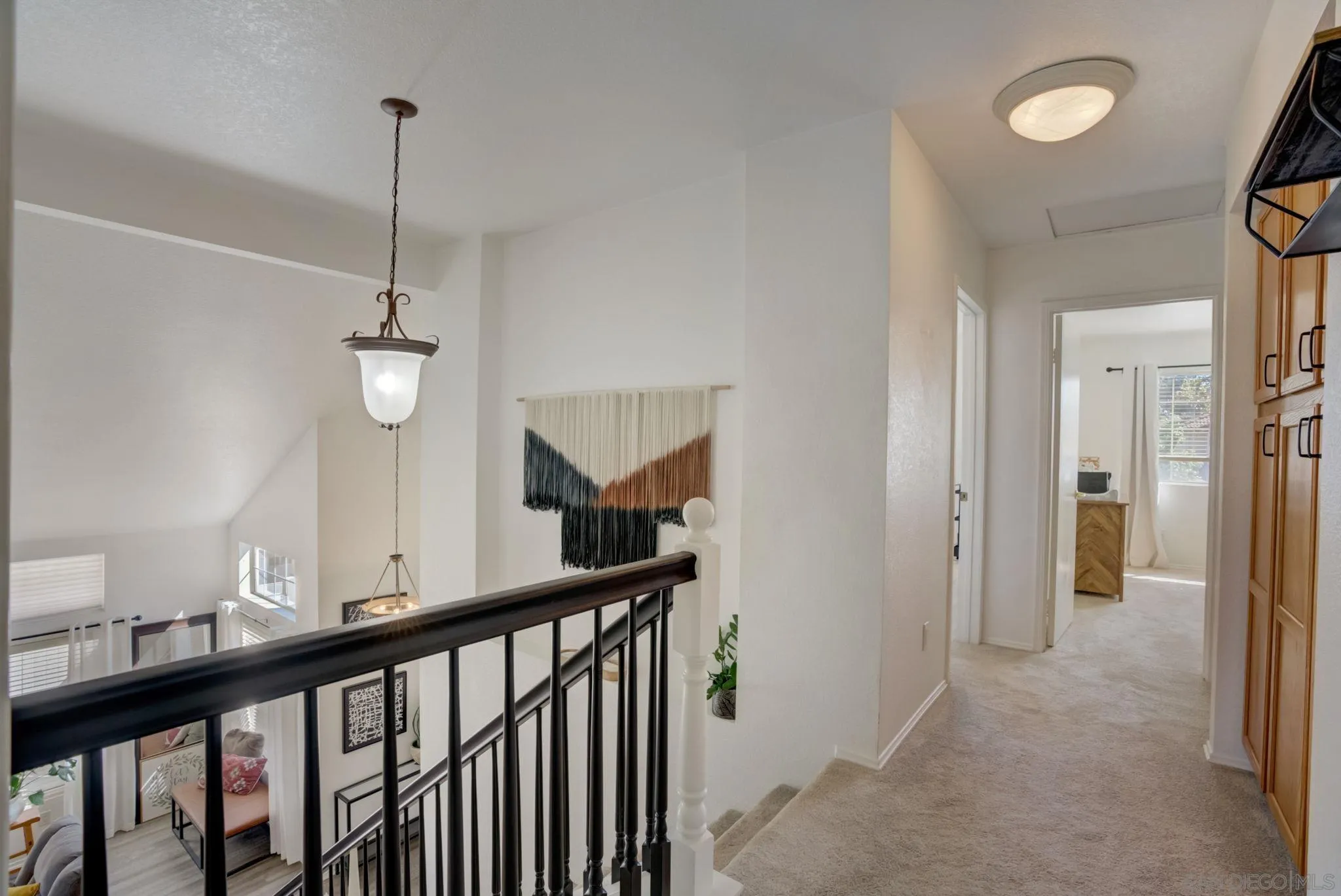 32012 Calle Espinosa Temecula, CA 92592 - Photo 27 of 53 a view of a hallway view with staircase