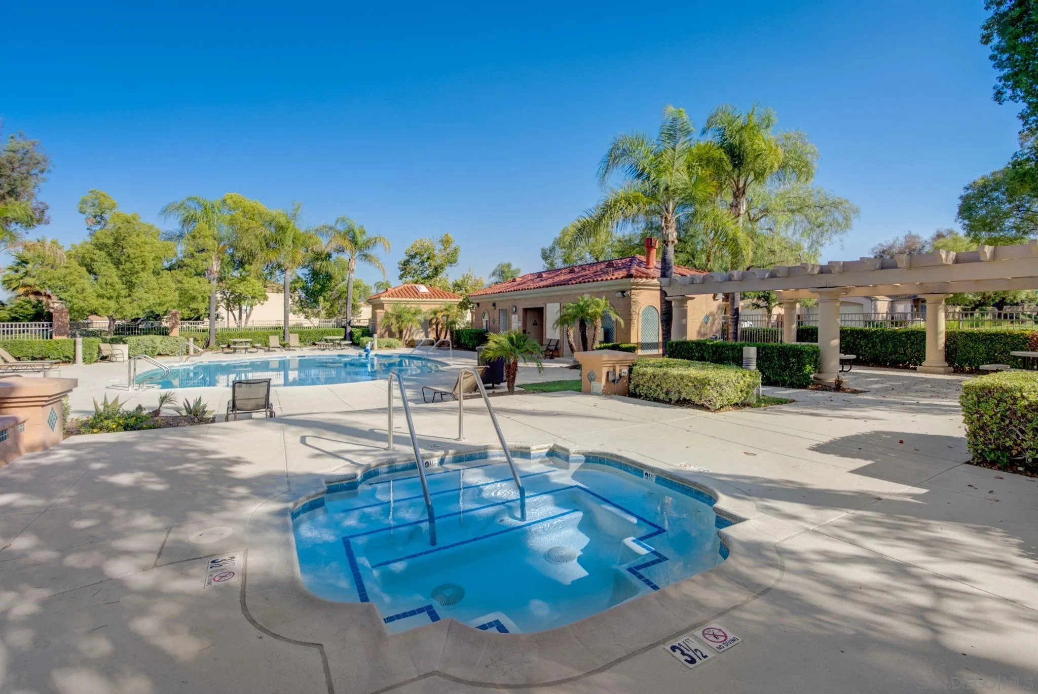 32012 Calle Espinosa Temecula, CA 92592 - Photo 33 of 53 a swimming pool with outdoor seating and yard