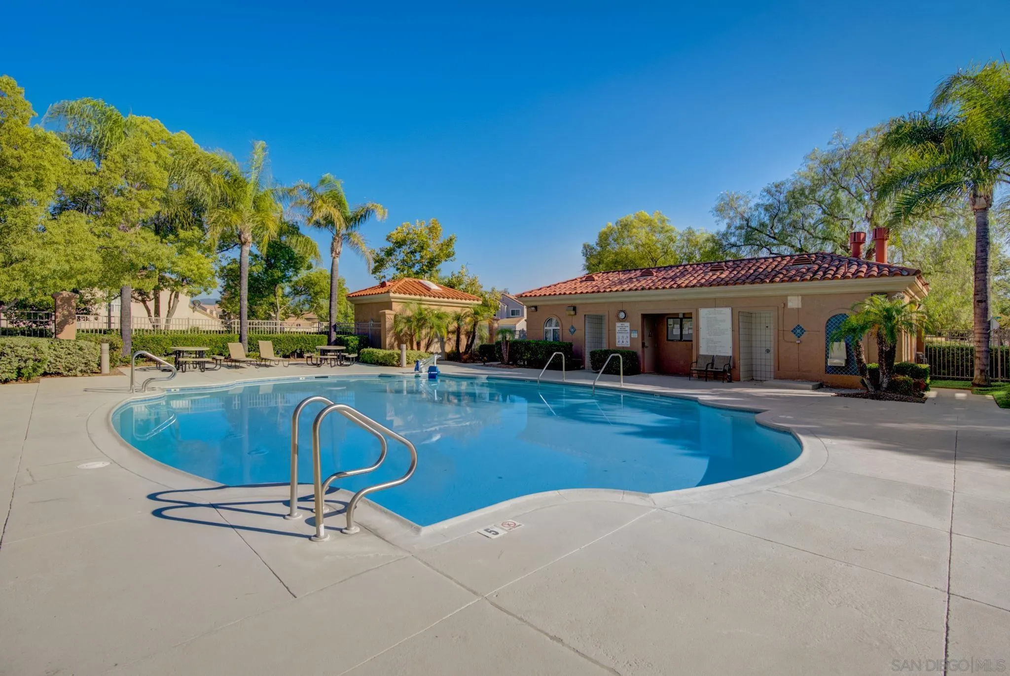 32012 Calle Espinosa Temecula, CA 92592 - Photo 34 of 53 a view of a house with swimming pool and sitting area