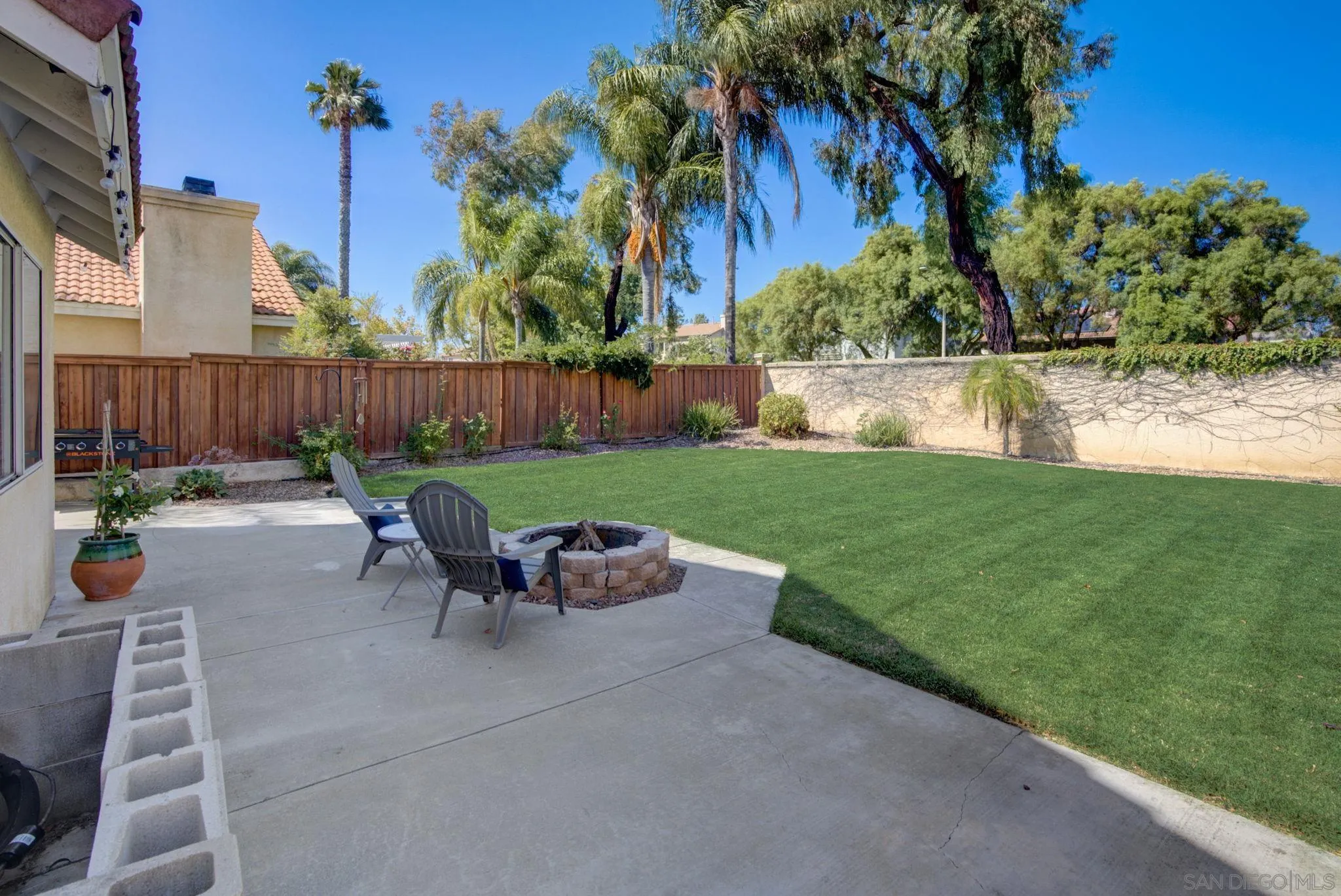 32012 Calle Espinosa Temecula, CA 92592 - Photo 38 of 53 a view of a table and chairs in the garden