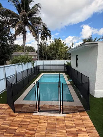 a view of a terrace with sitting area