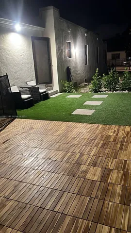 a view of swimming pool with yard