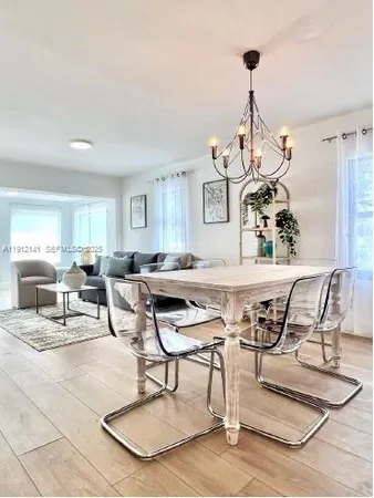 a living room with patio furniture