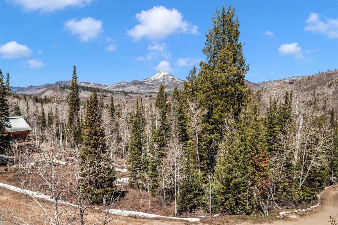 57930 Jupiter Place Clark, CO 80428 - Photo 5 of 10 a view of a large building with a mountain in the background