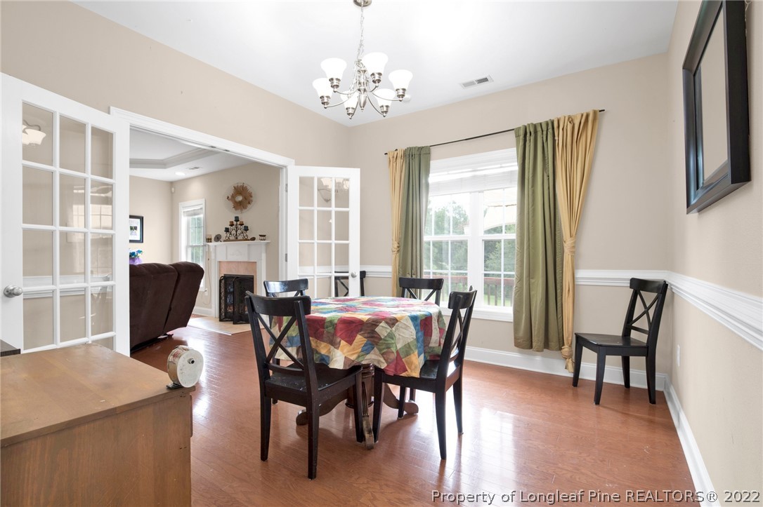 515 Booth Pond Road Raeford, NC 28376 - Photo 12 of 39 a view of a dining room with furniture window and outside view