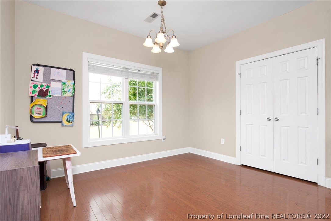 515 Booth Pond Road Raeford, NC 28376 - Photo 18 of 39 a very nice looking room with a large window