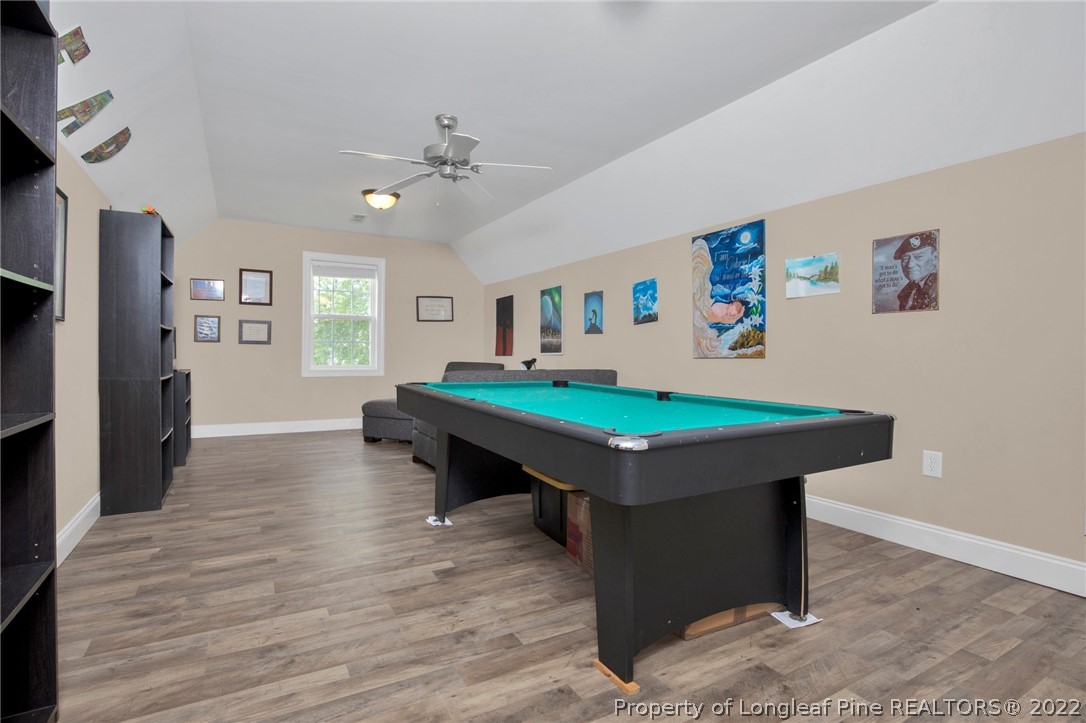 515 Booth Pond Road Raeford, NC 28376 - Photo 27 of 39 a room with pool table and windows