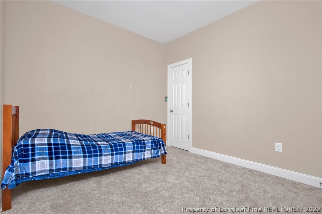 515 Booth Pond Road Raeford, NC 28376 - Photo 32 of 39 a view of bedroom with furniture
