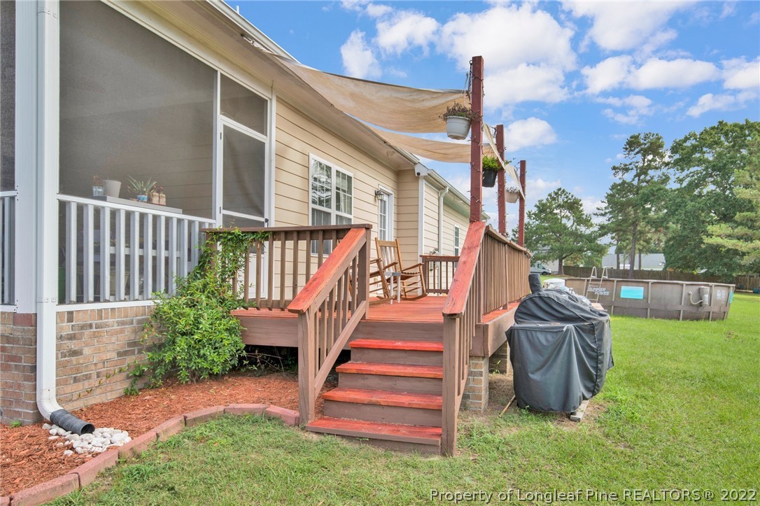 515 Booth Pond Road Raeford, NC 28376 - Photo 33 of 39 a view of a backyard with stairs