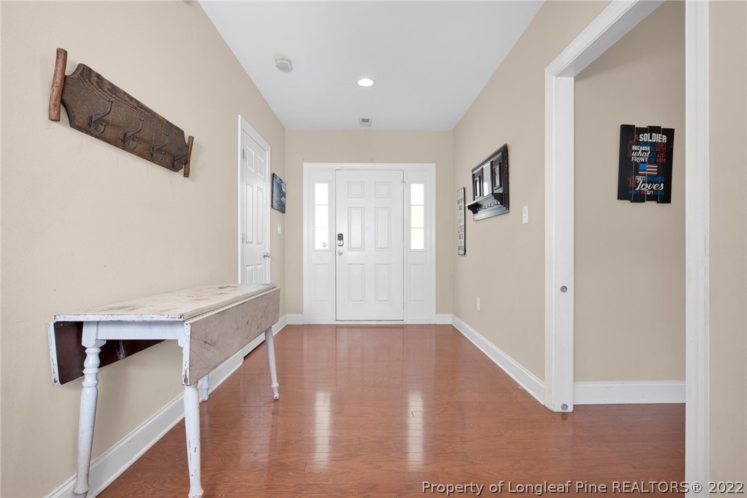 515 Booth Pond Road Raeford, NC 28376 - Photo 6 of 39 a view of a livingroom with wooden floor