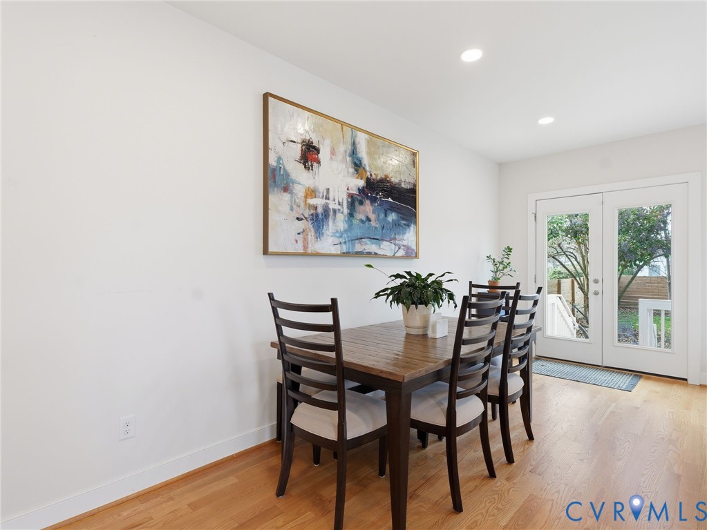 1202 North 34th Street Richmond, VA 23223 - Photo 14 of 36 Dining space featuring french doors, light wood fi