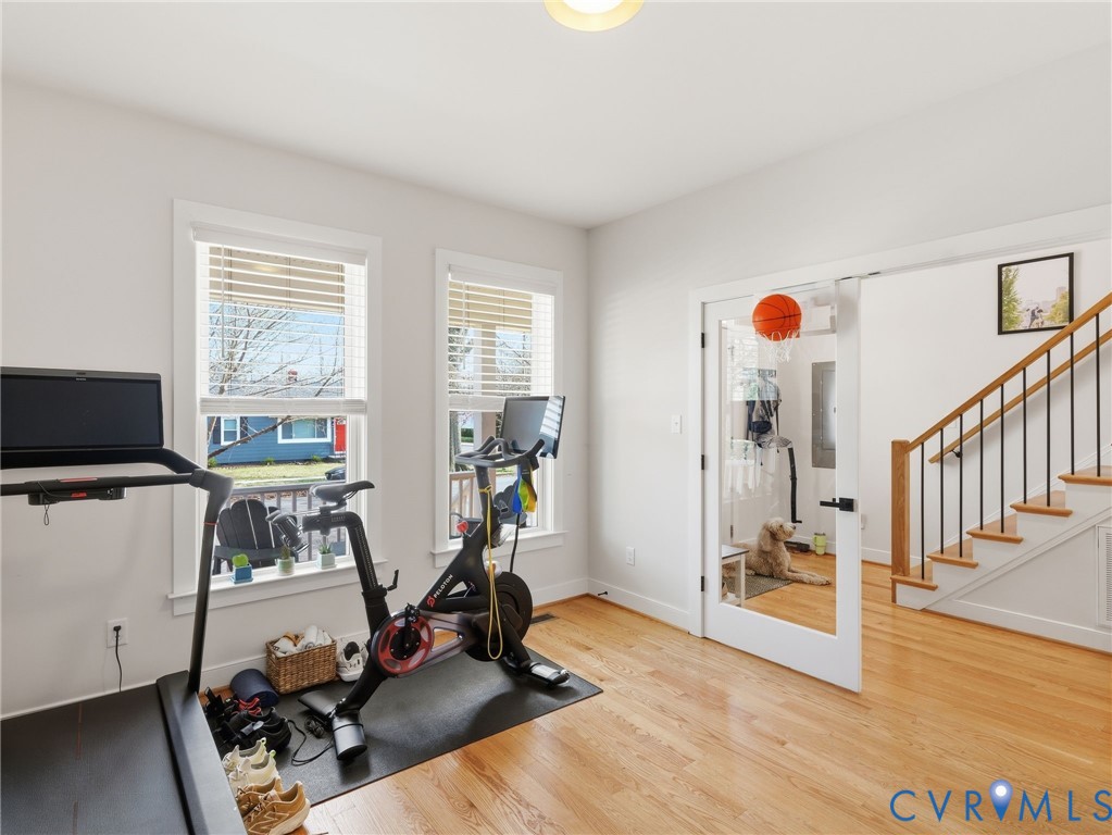 1202 North 34th Street Richmond, VA 23223 - Photo 16 of 36 Exercise room with light wood-type flooring and ba