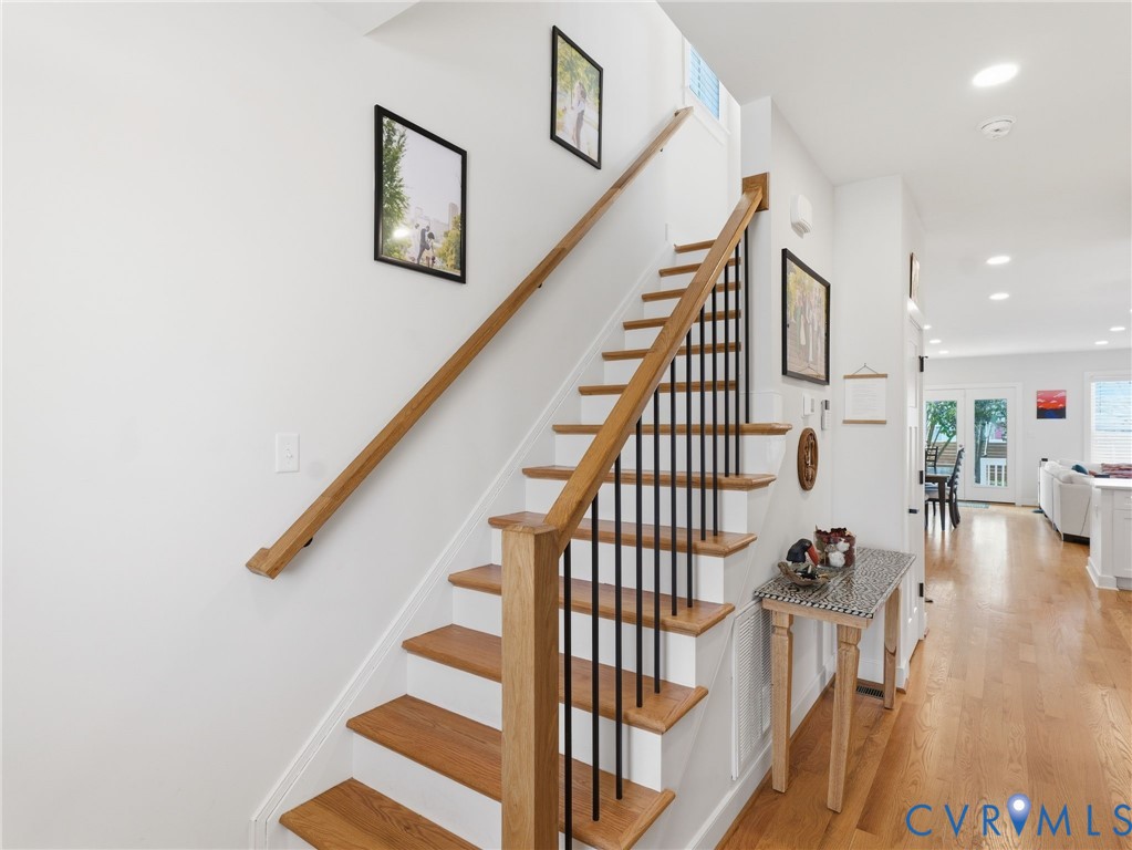 1202 North 34th Street Richmond, VA 23223 - Photo 18 of 36 Staircase featuring wood finished floors and reces
