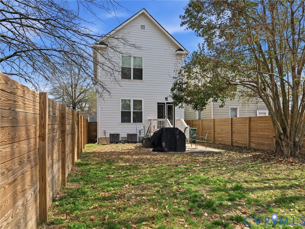 1202 North 34th Street Richmond, VA 23223 - Photo 33 of 36 Back of house featuring a fenced backyard