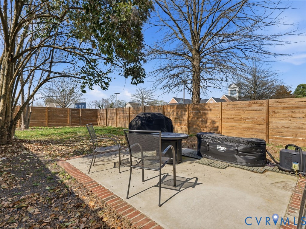1202 North 34th Street Richmond, VA 23223 - Photo 35 of 36 Fenced backyard featuring a patio
