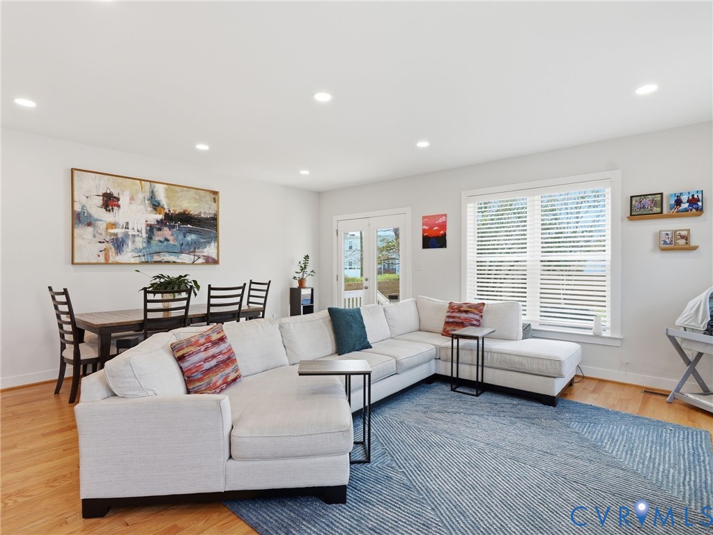 1202 North 34th Street Richmond, VA 23223 - Photo 10 of 36 Living area featuring light wood-style floors and