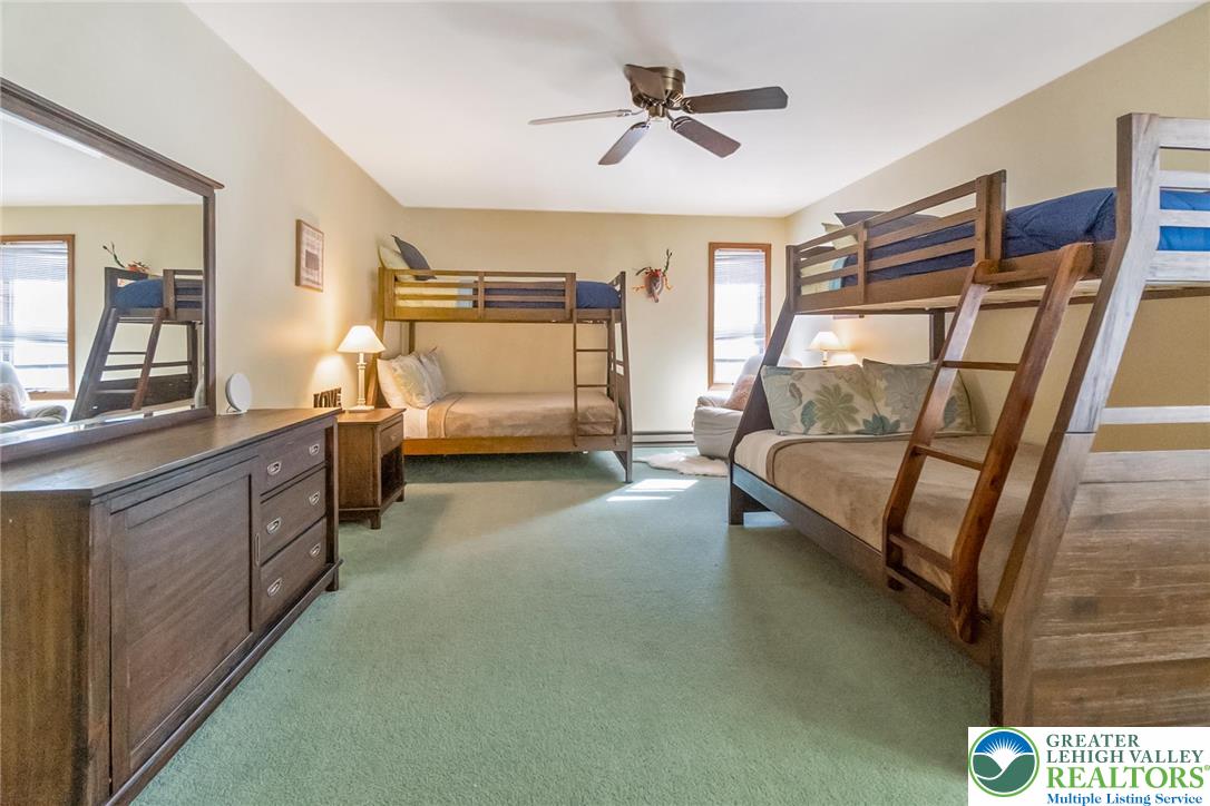 143 Moseywood Road Lake Harmony, PA 18624 - Photo 36 of 48 a bedroom with furniture and window