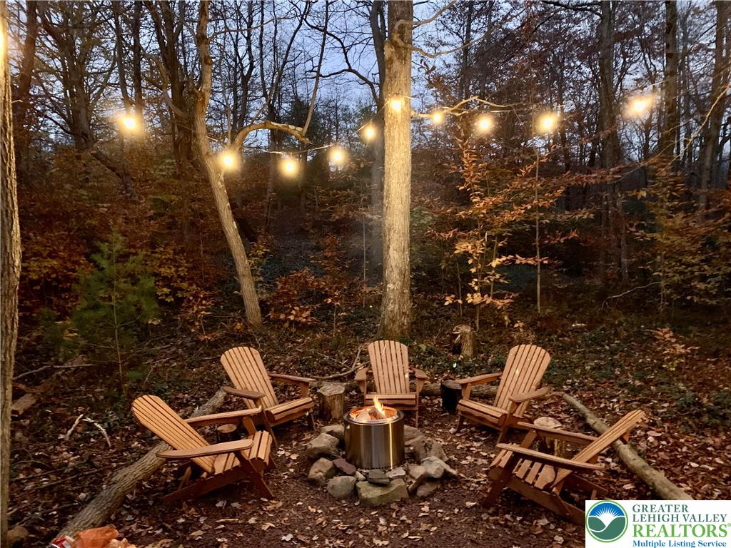143 Moseywood Road Lake Harmony, PA 18624 - Photo 40 of 48 a couple of table and chairs in the patio