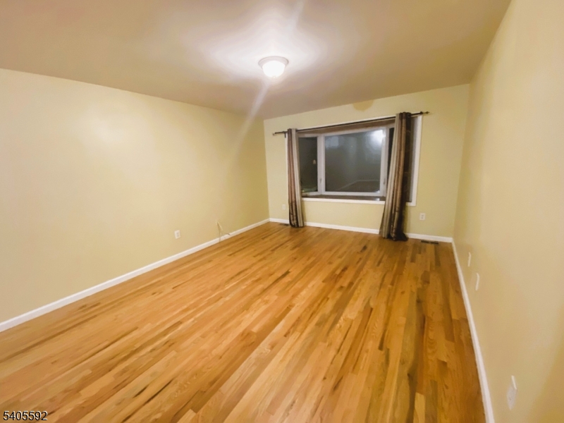 94 Palm Street, Unit 1 Newark, NJ 07106 - Photo 19 of 24 a view of an empty room