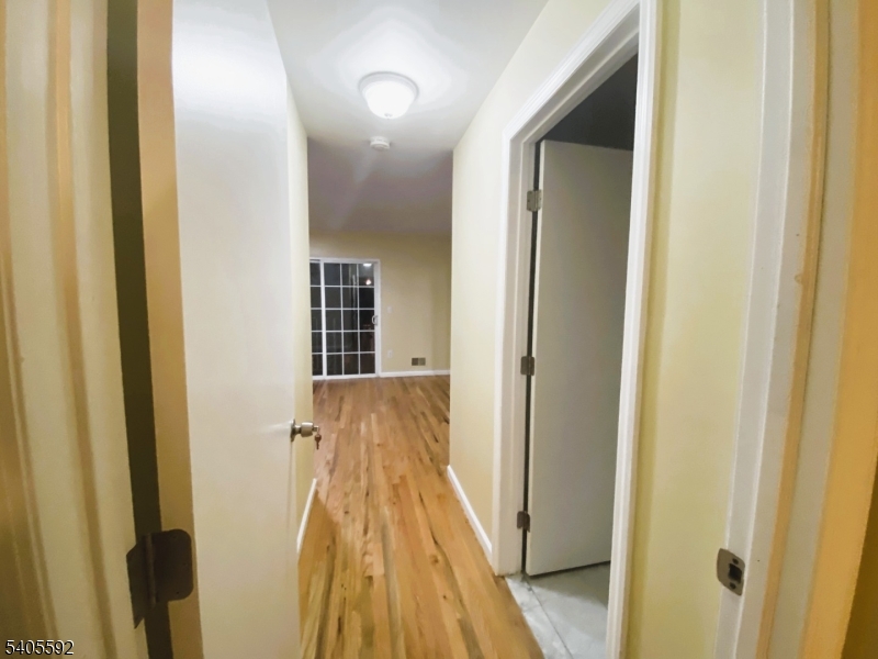 94 Palm Street, Unit 1 Newark, NJ 07106 - Photo 9 of 24 a view of a bathroom from the hallway