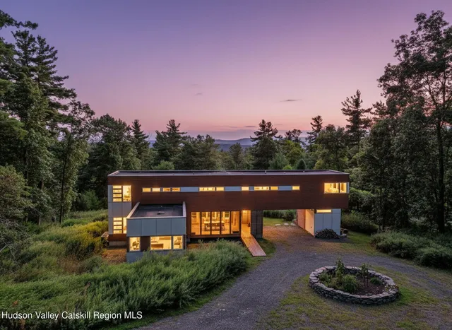 a view of a chair and tables on the side of the road