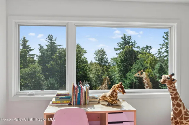 a view of a window and chair in the room
