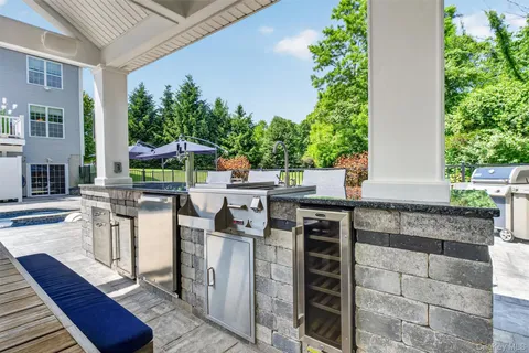 a patio with patio a couch and chairs