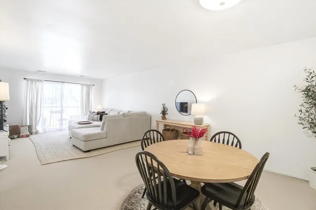 a living room with furniture and window