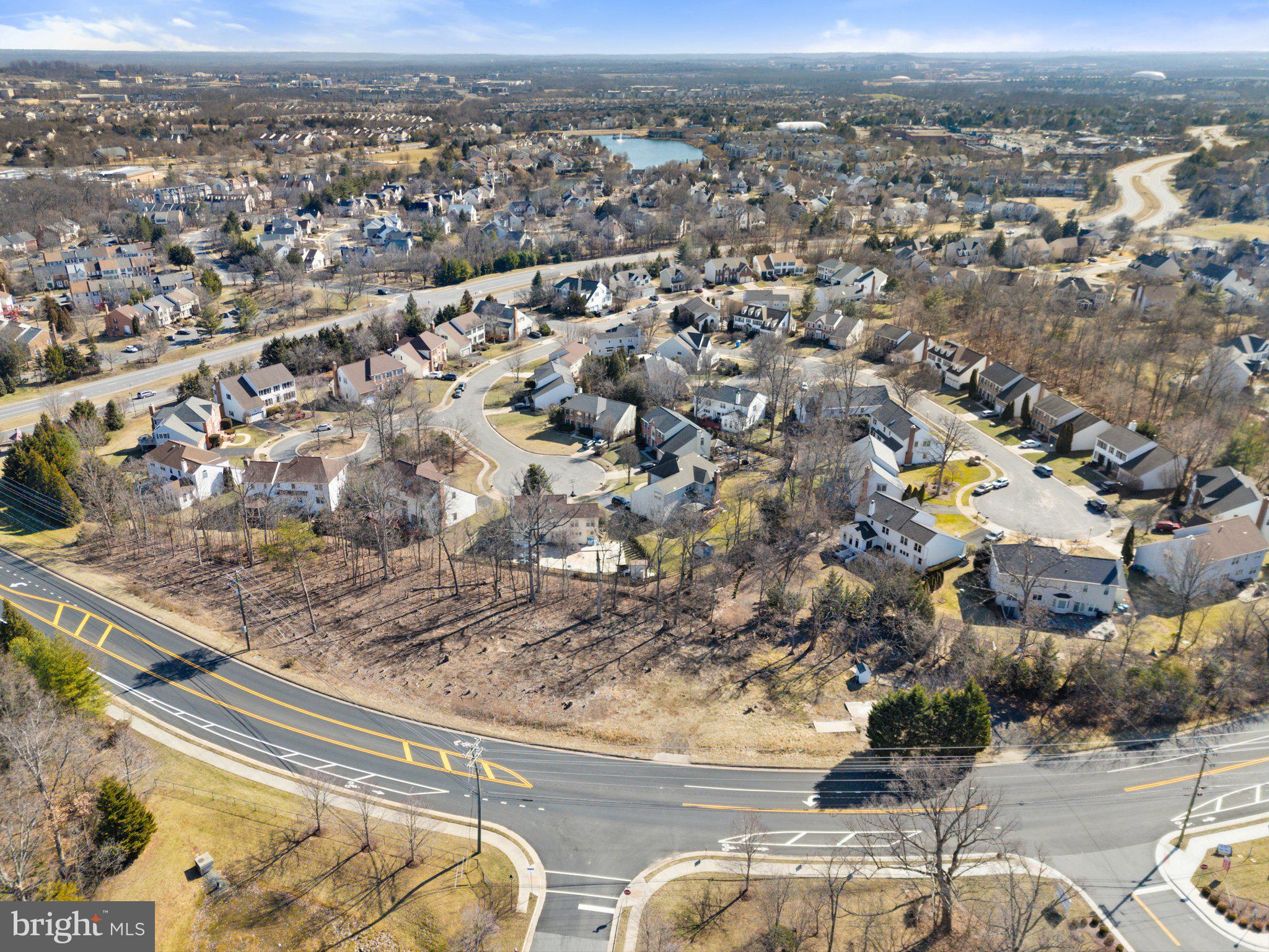 20576 Ashburn Road Ashburn, VA 20147 - Photo 5 of 16 an aerial view of multiple house