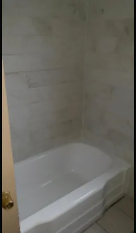 a close up of a bathtub