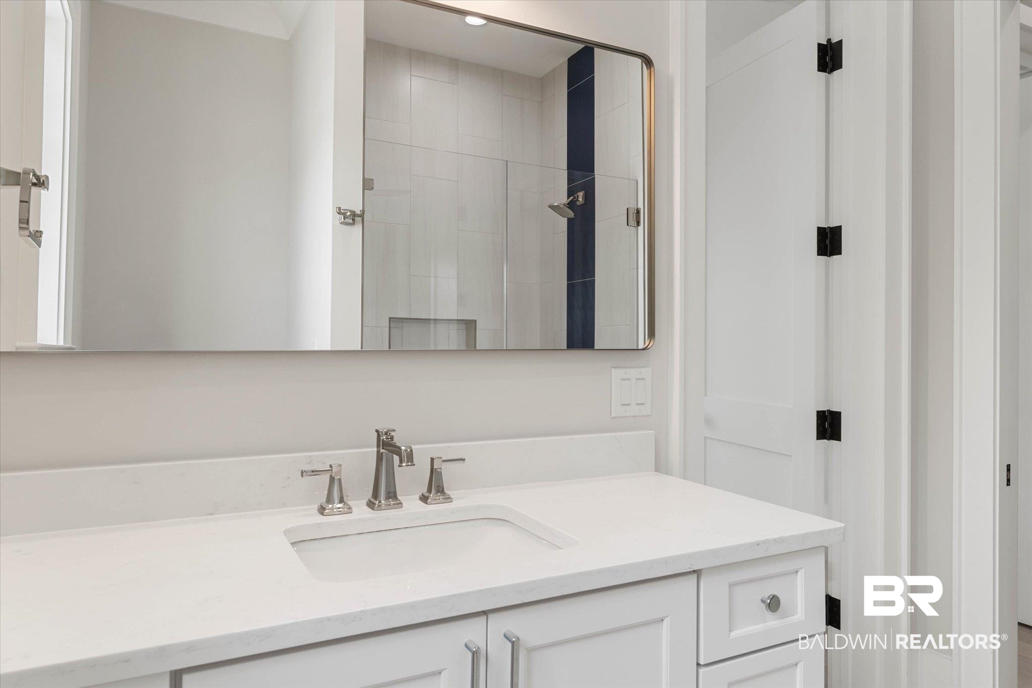 853 Inlet Circle Gulf Shores, AL 36542 - Photo 34 of 55 Full bathroom with vanity and a tile shower