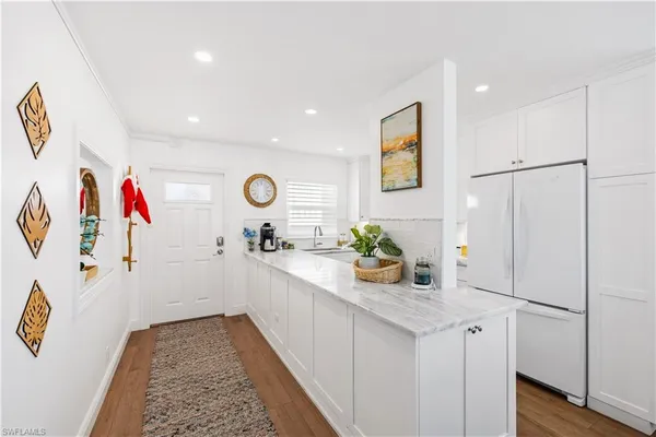 $9,995 | 404 Broad Avenue South, Unit H404, Naples, FL 34102