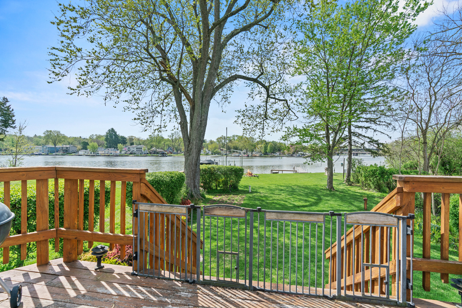 1307 Tower Lane Cary, IL 60013 - Photo 13 of 26 a view of a deck with mountain view and a garden