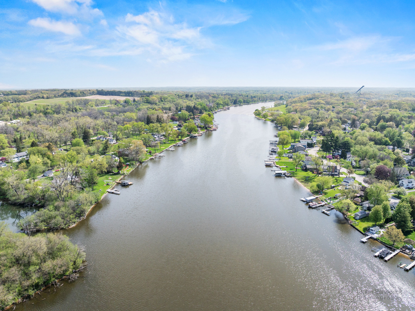 1307 Tower Lane Cary, IL 60013 - Photo 21 of 26 an aerial view of a city with lots of residential buildings