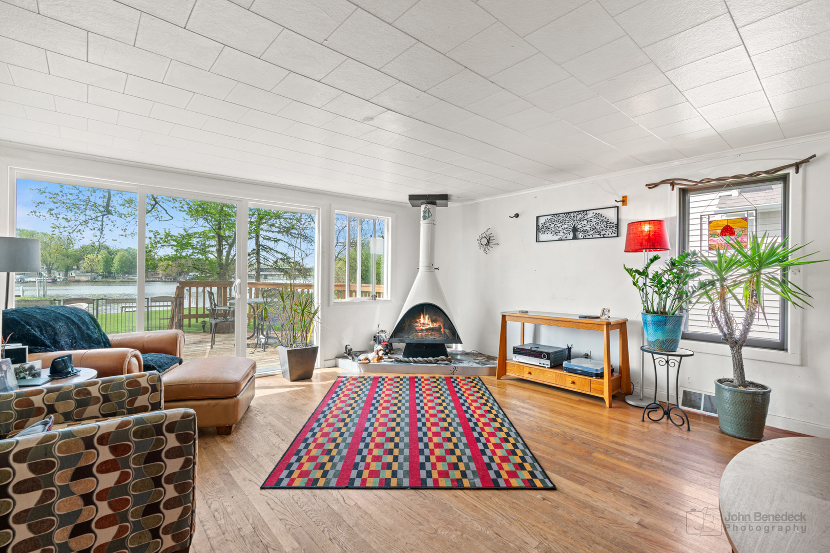 1307 Tower Lane Cary, IL 60013 - Photo 6 of 26 a living room with furniture large window and a flat screen tv