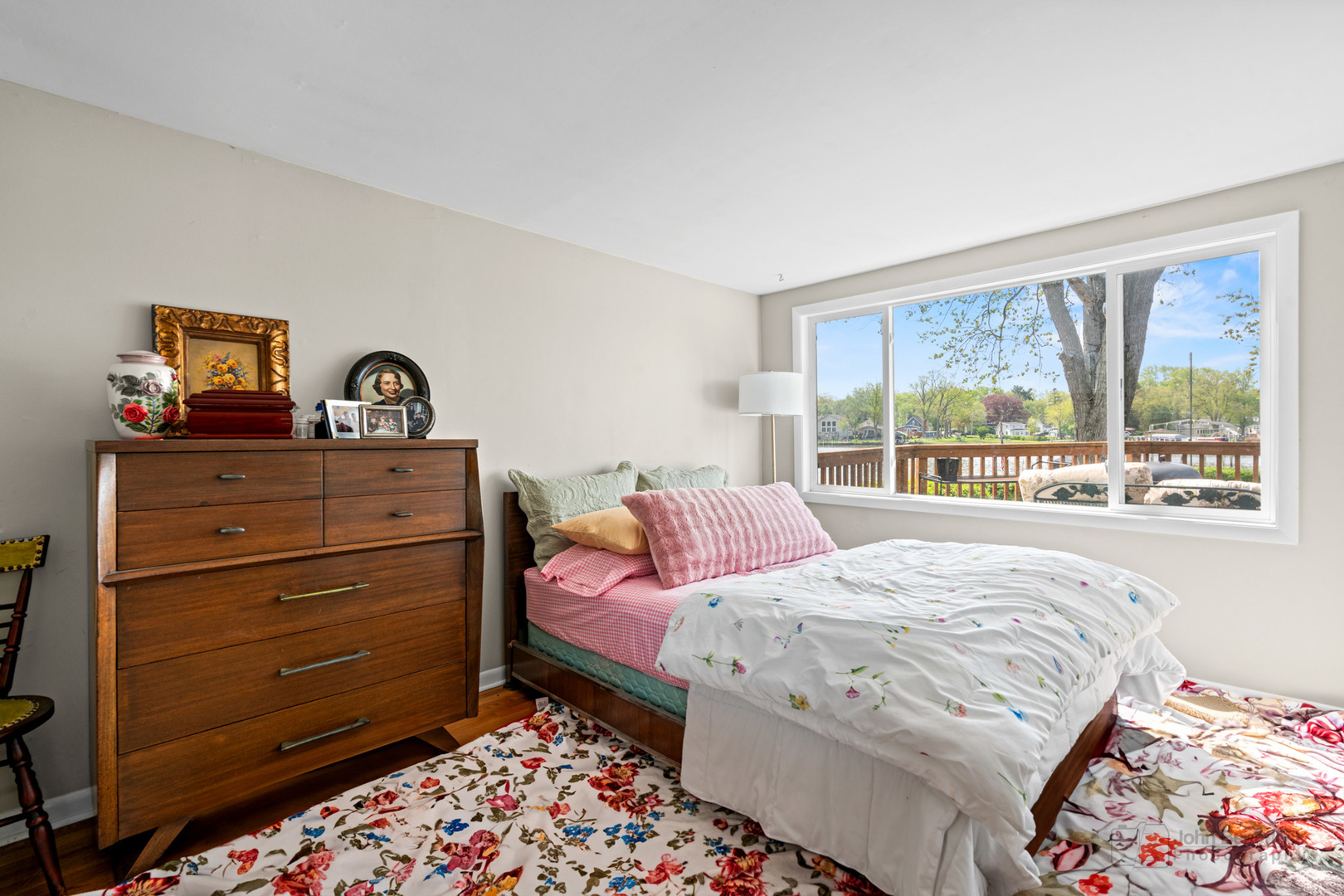 1307 Tower Lane Cary, IL 60013 - Photo 8 of 26 a bedroom with a bed and a window