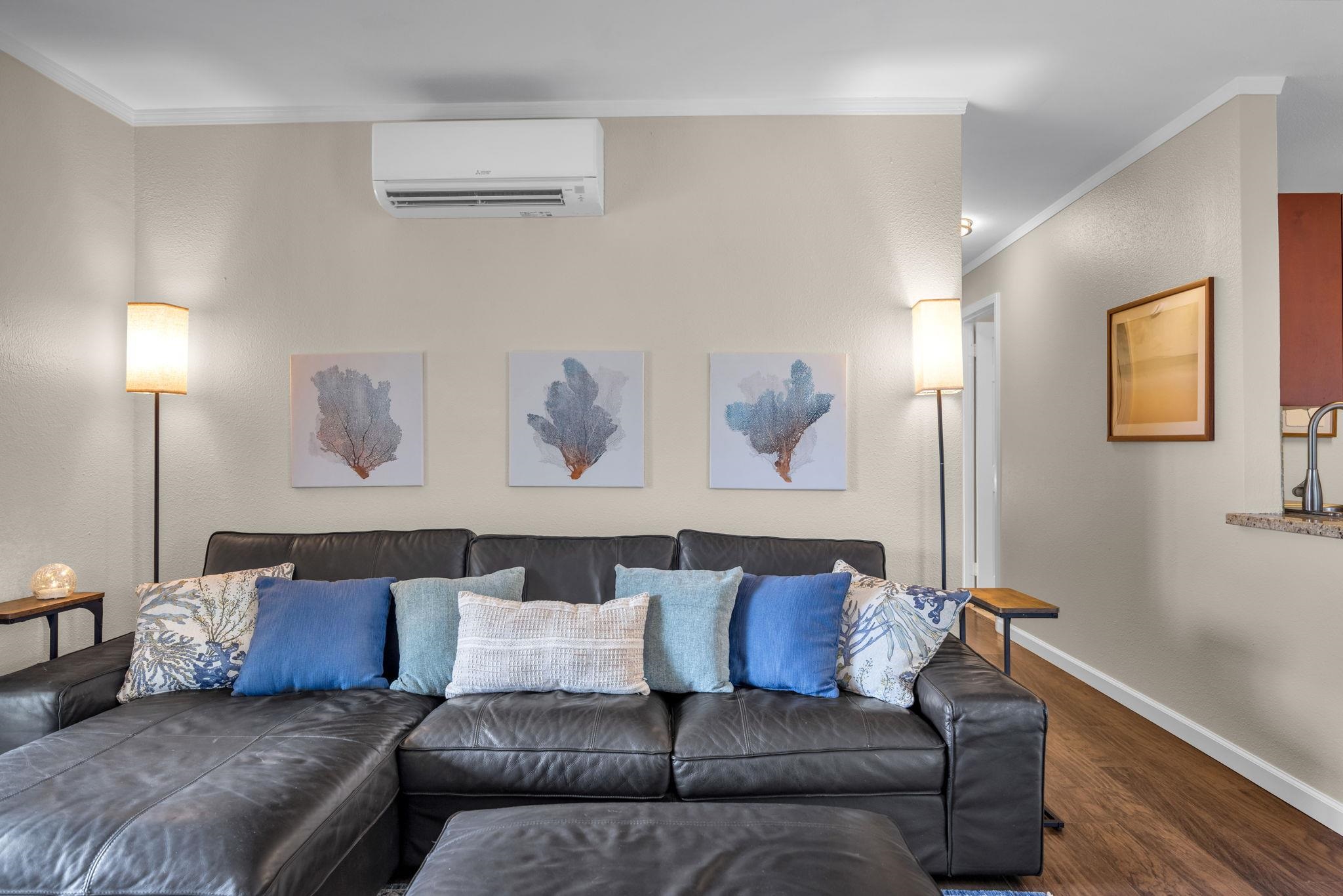 140 Uwapo Road, Unit 53201 Kihei, HI 96753 - Photo 5 of 28 a living room with a couch