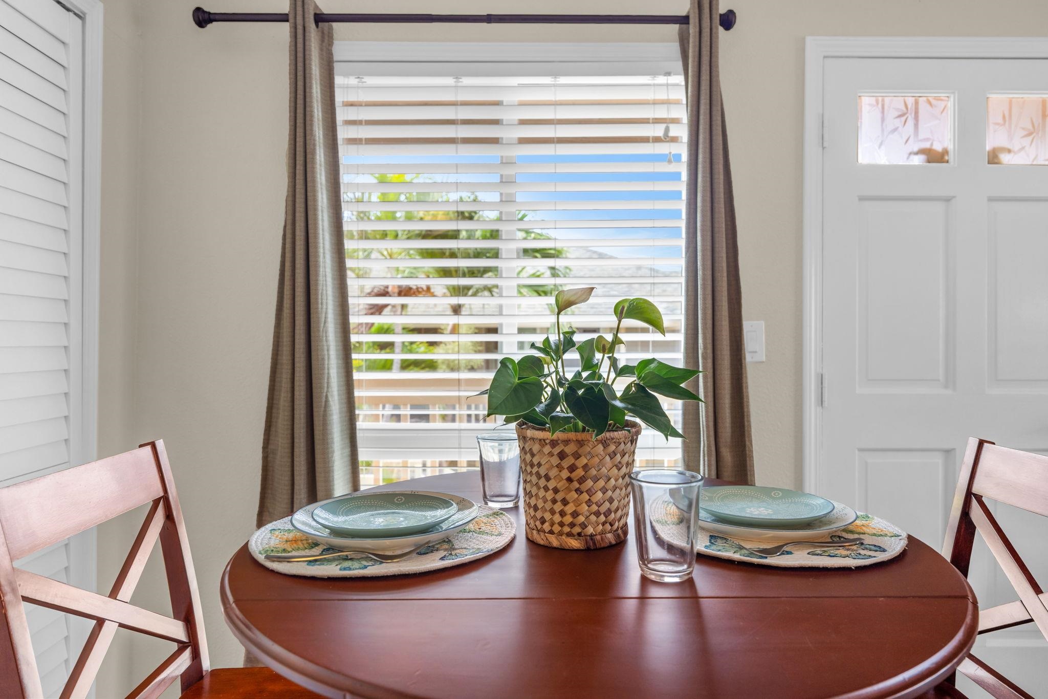 140 Uwapo Road, Unit 53201 Kihei, HI 96753 - Photo 10 of 28 a dining room with furniture and wooden floor