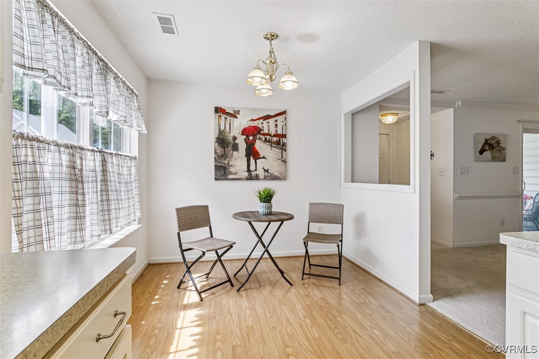 262 Claiborne Drive Williamsburg, VA 23185 - Photo 12 of 49 Sitting room with light wood-style flooring, a tex