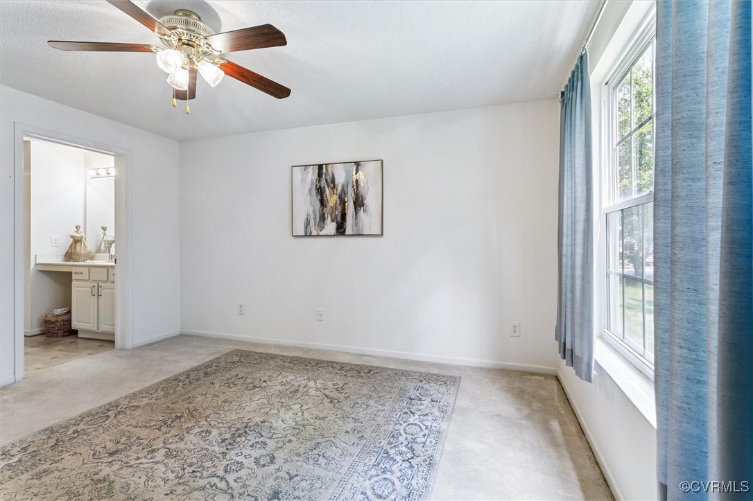 262 Claiborne Drive Williamsburg, VA 23185 - Photo 29 of 49 Unfurnished room with light carpet and ceiling fan