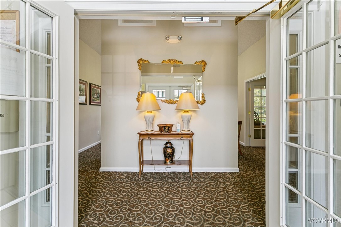262 Claiborne Drive Williamsburg, VA 23185 - Photo 41 of 49 Hallway featuring baseboards and french doors