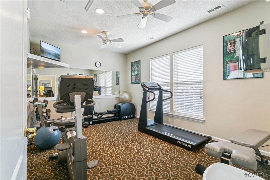 262 Claiborne Drive Williamsburg, VA 23185 - Photo 44 of 49 Workout room featuring ceiling fan, a textured cei
