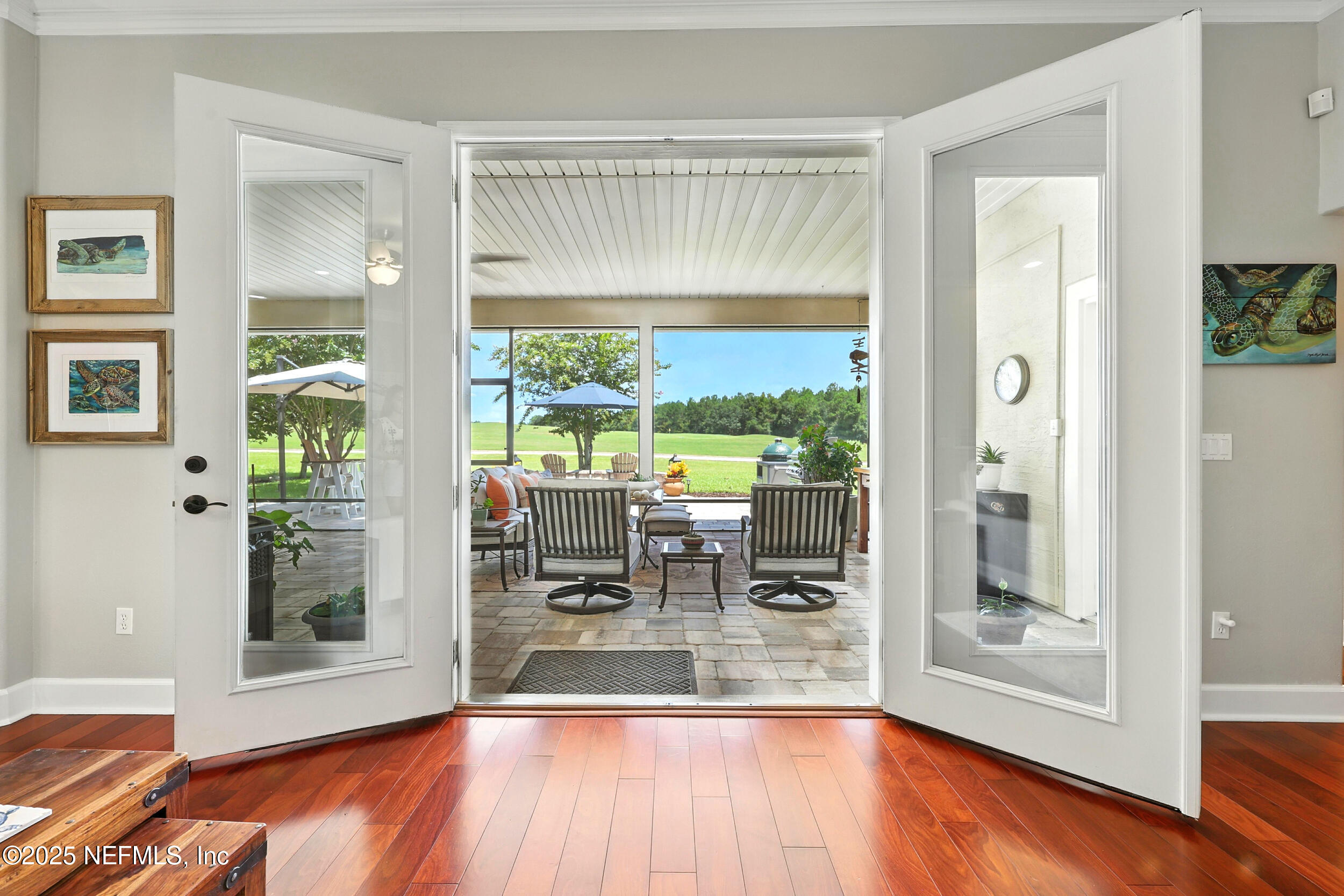 1185 Garrison Drive St. Augustine, FL 32092 - Photo 11 of 70 a view of empty room with wooden floor and fan