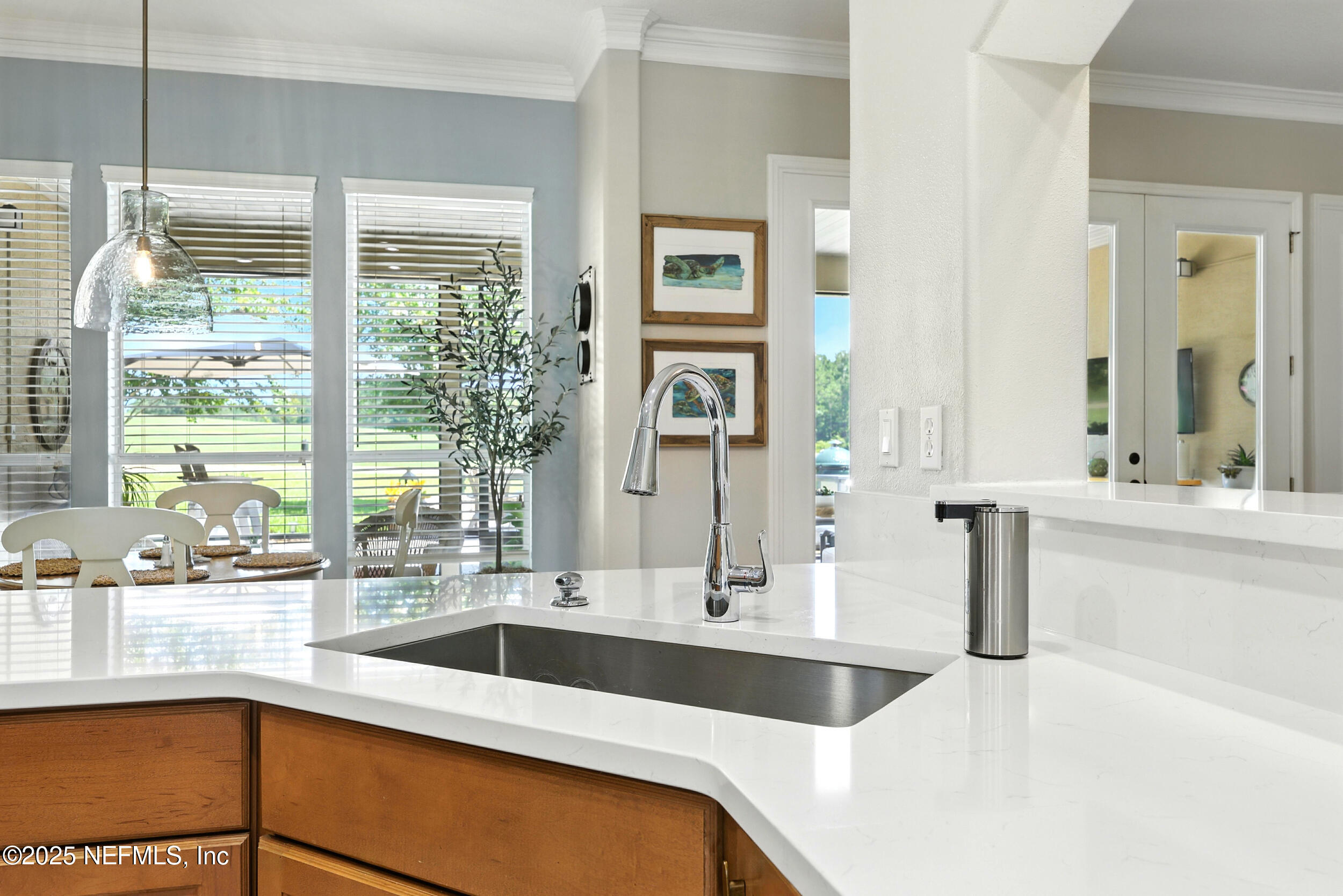 1185 Garrison Drive St. Augustine, FL 32092 - Photo 17 of 70 a kitchen with a sink and a large window