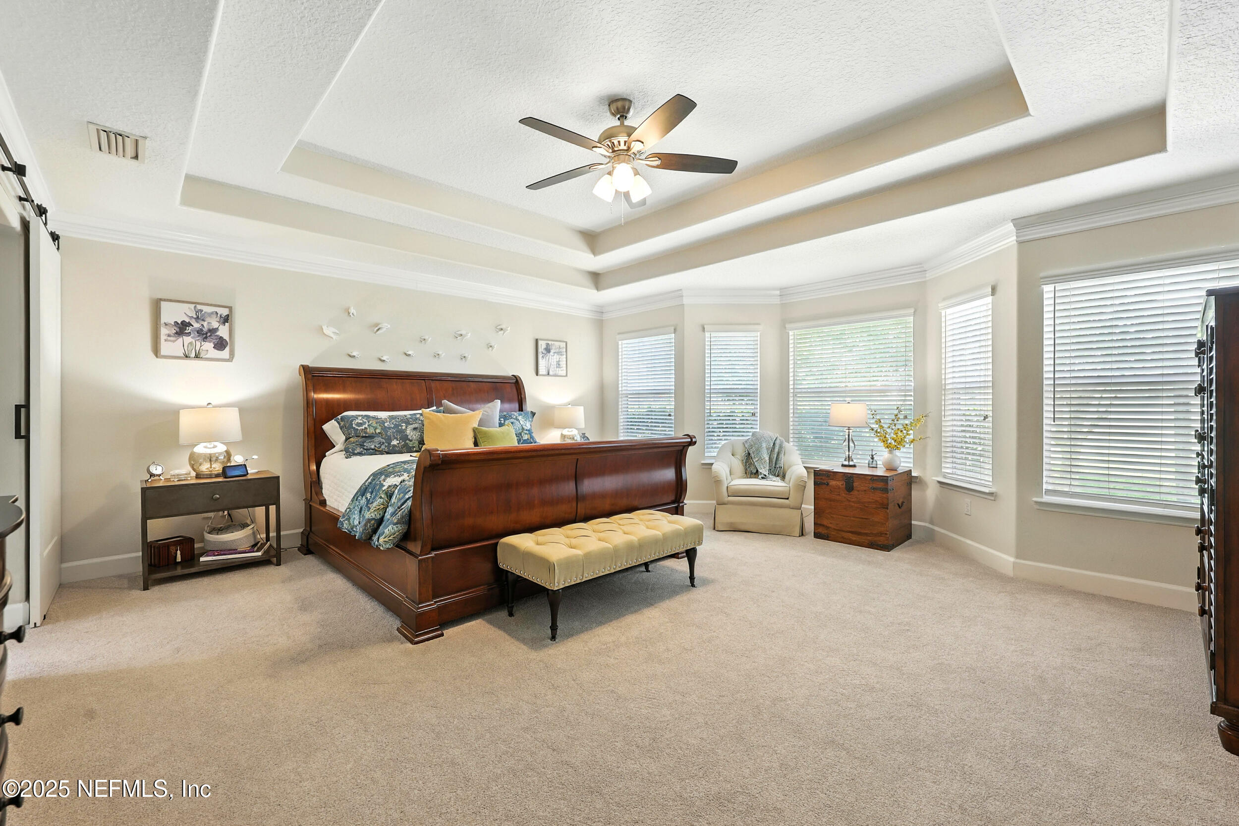 1185 Garrison Drive St. Augustine, FL 32092 - Photo 22 of 70 a bedroom with furniture and a large window