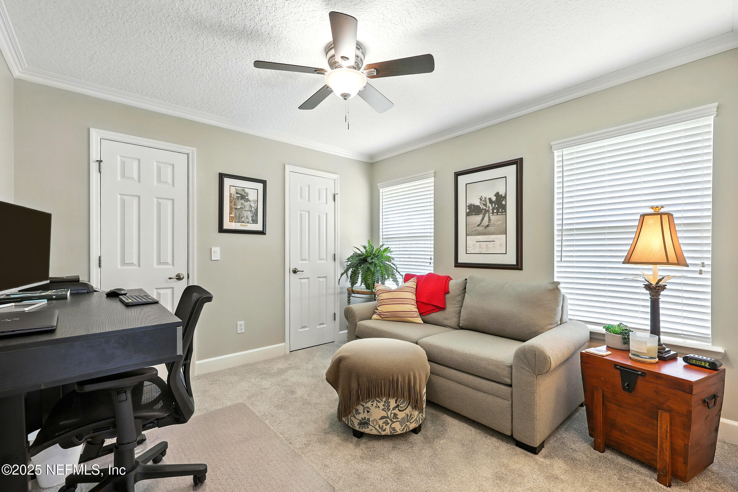 1185 Garrison Drive St. Augustine, FL 32092 - Photo 30 of 70 a living room with furniture and a flat screen tv