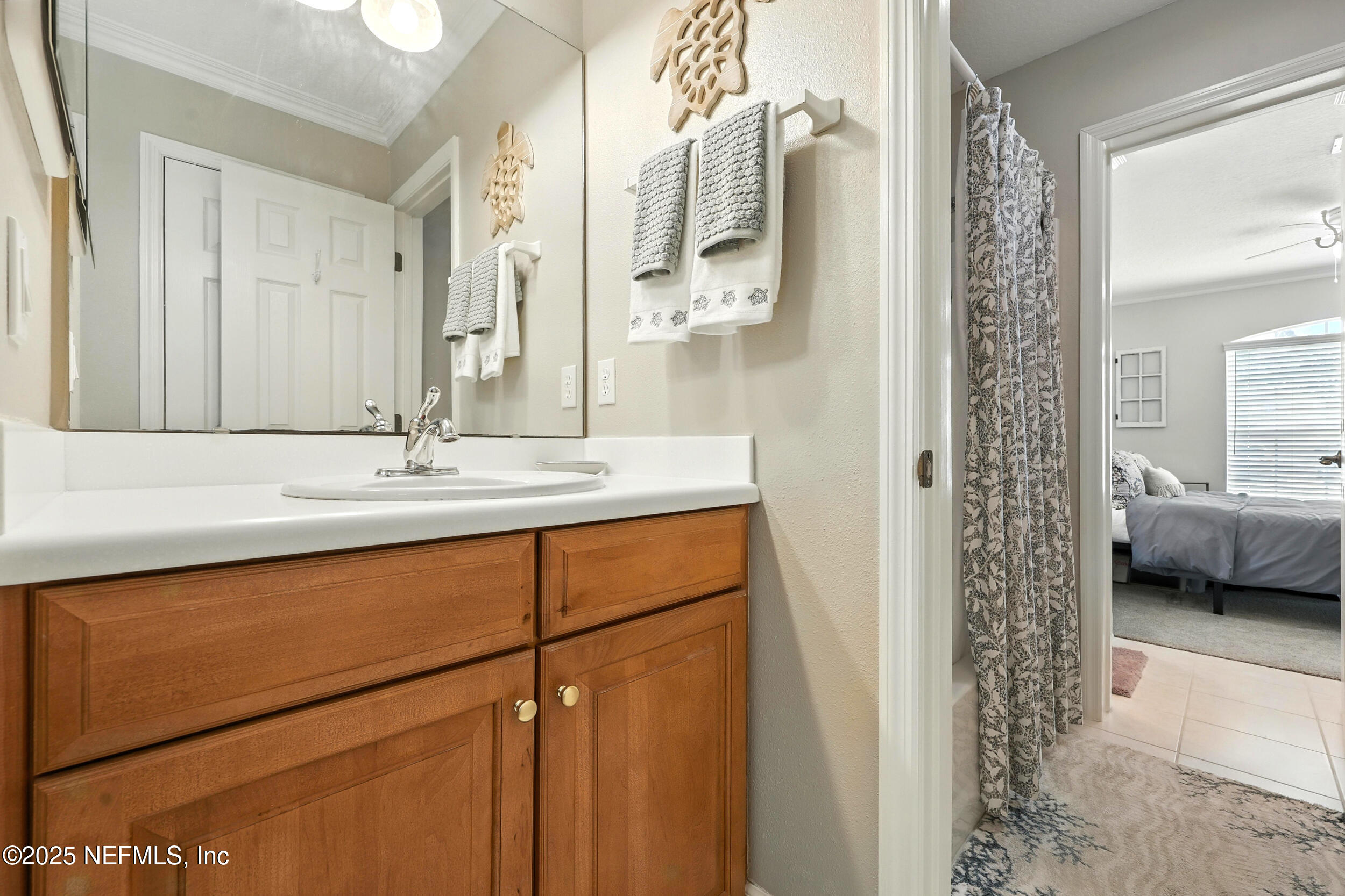 1185 Garrison Drive St. Augustine, FL 32092 - Photo 32 of 70 a bathroom with a shower and a sink