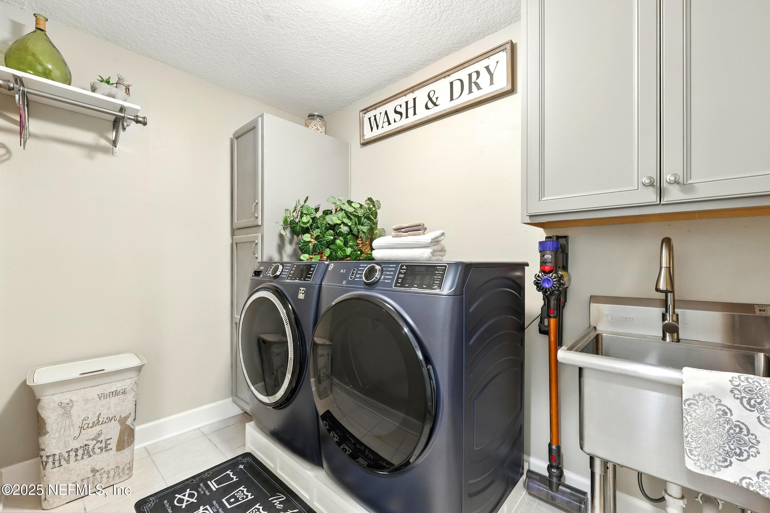 1185 Garrison Drive St. Augustine, FL 32092 - Photo 37 of 70 a utility room with dryer and washer
