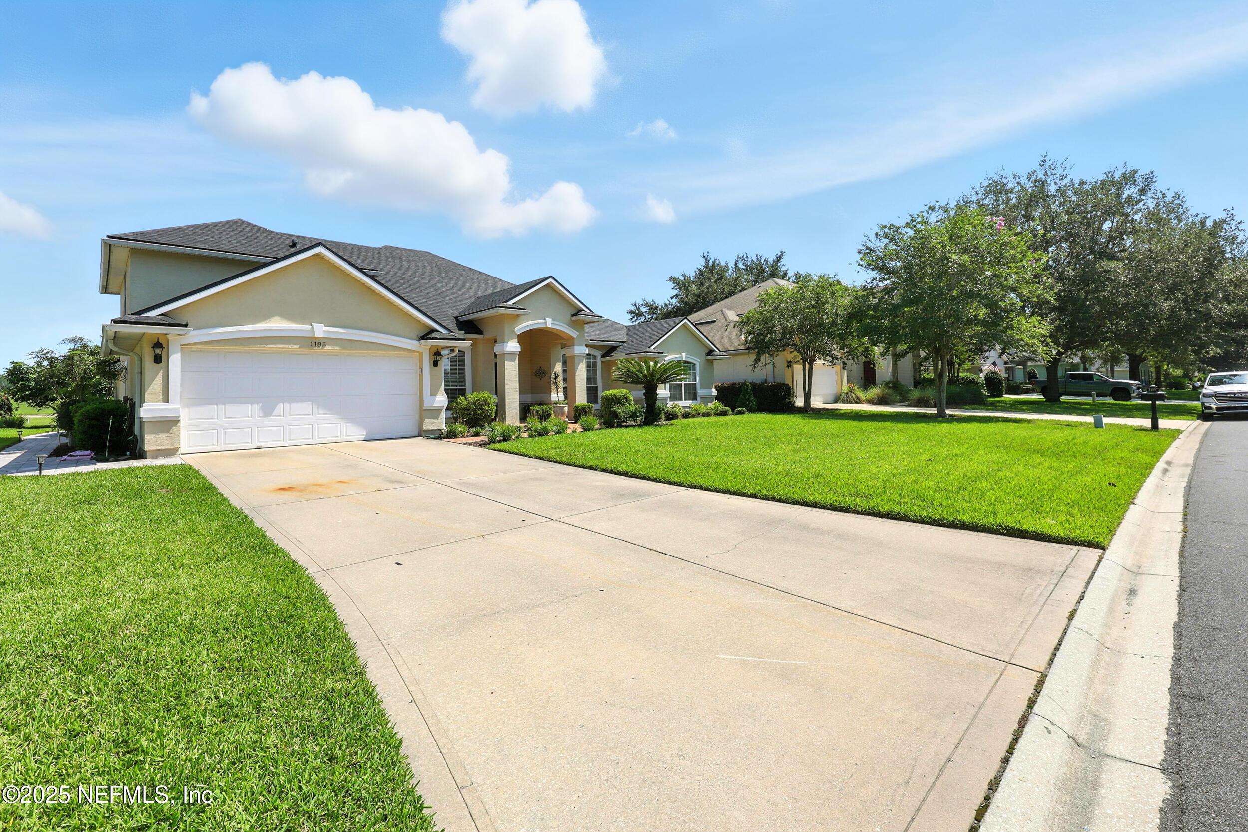 1185 Garrison Drive St. Augustine, FL 32092 - Photo 52 of 70 a front view of a house with a yard