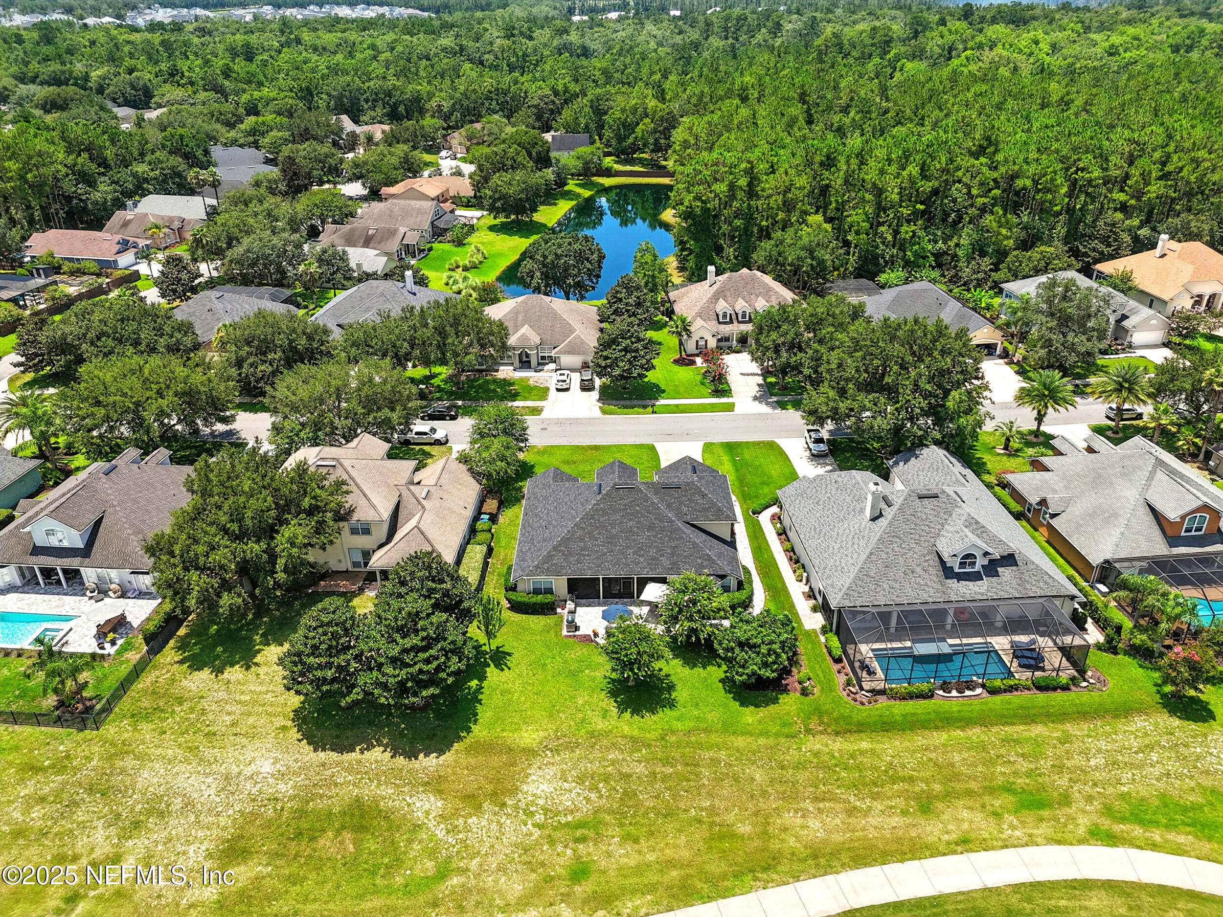 1185 Garrison Drive St. Augustine, FL 32092 - Photo 54 of 70 an aerial view of residential houses with outdoor space and swimming pool